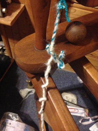 A string of badly spun yarn all buckled and knotted
